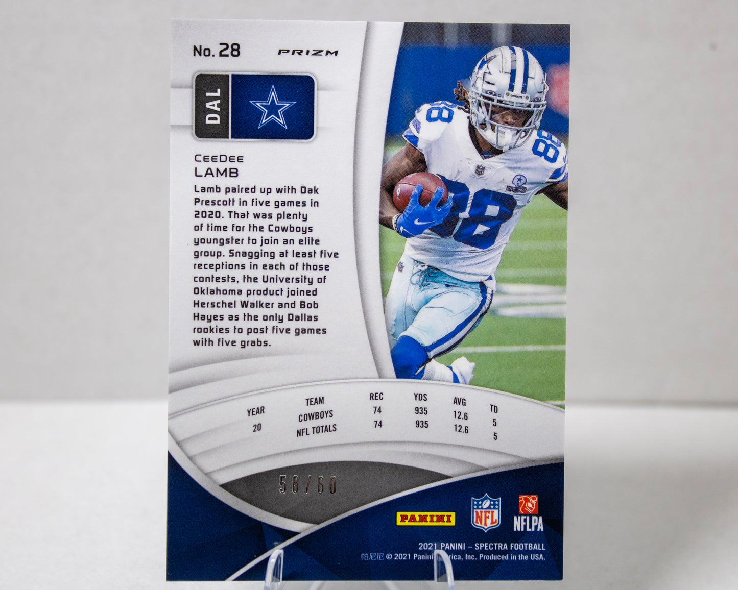 CeeDee Lamb – Panini Spectra Blue Disco Prizm /60 (No. 28)