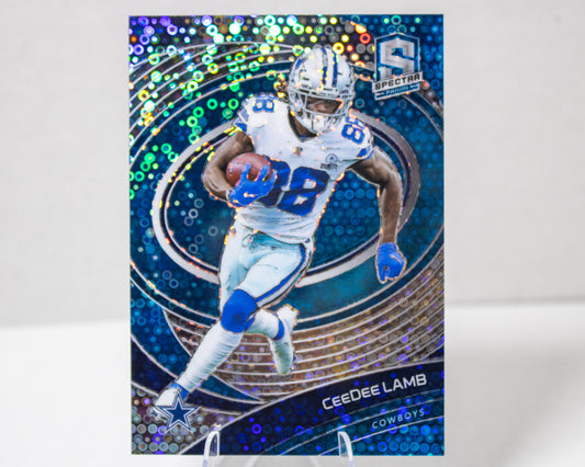 CeeDee Lamb – Panini Spectra Blue Disco Prizm /60 (No. 28)
