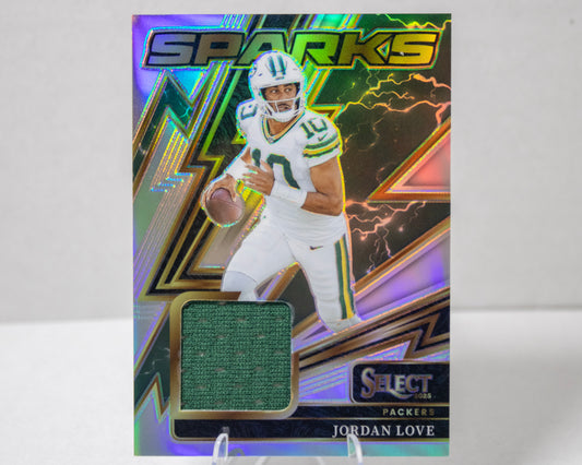 Jordan Love – Panini Select Sparks Memorabilia /149 (No. SPK‑JLE)